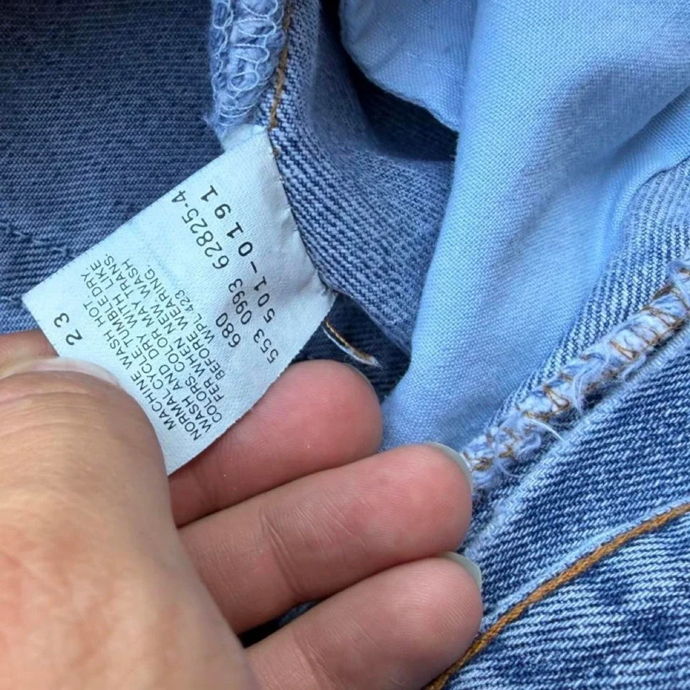 Vintage 90s Levi's 501s made in USA button fly jeans size 36x29